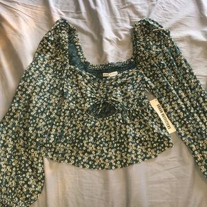 Urban outfitters cute floral top. New with tags.